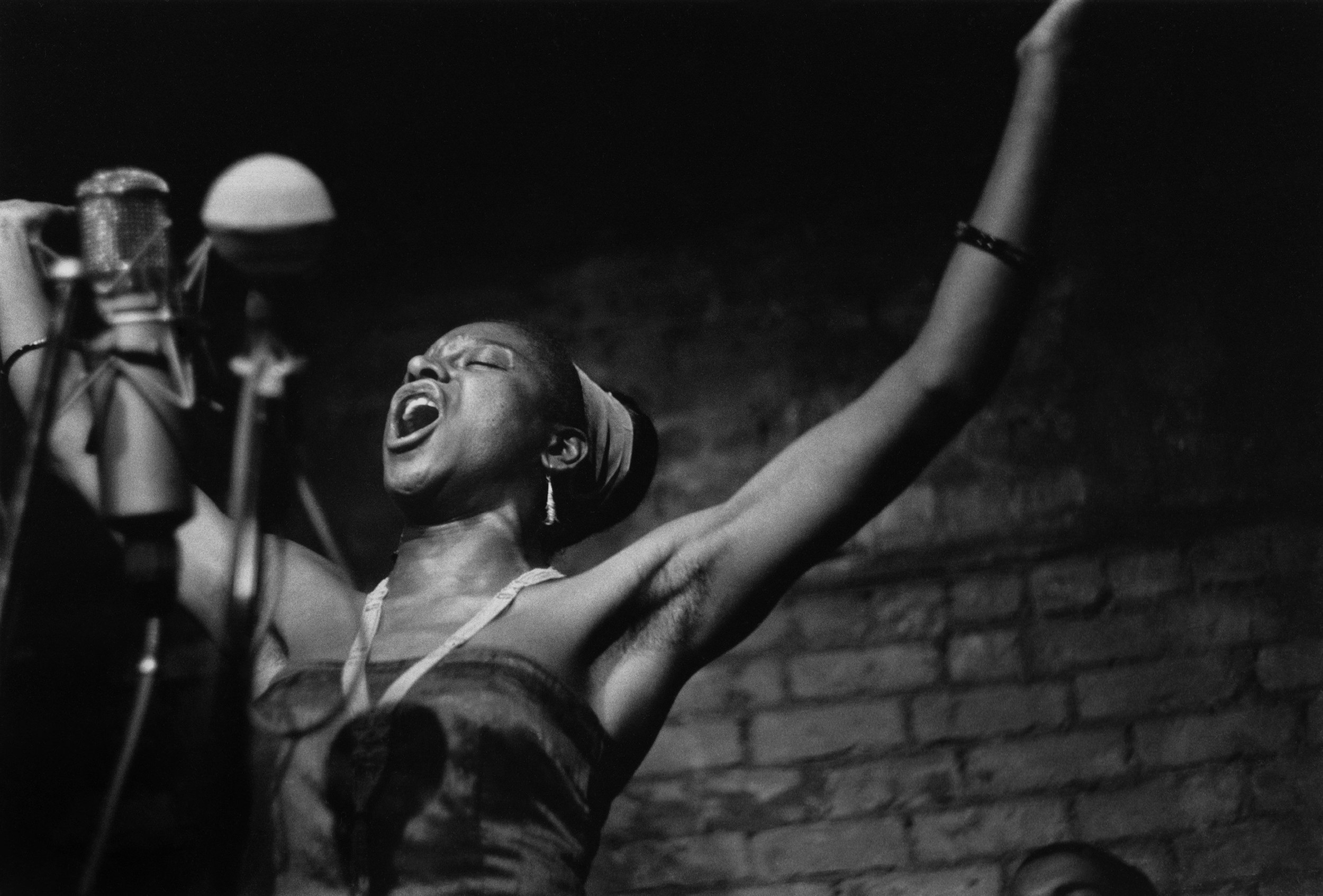 Miriam Makeba performs at the Bitter End in Greenwich Village, New York City, 1961. Photos by Sigmund Goode via Michael Ochs Archive/Getty Images.